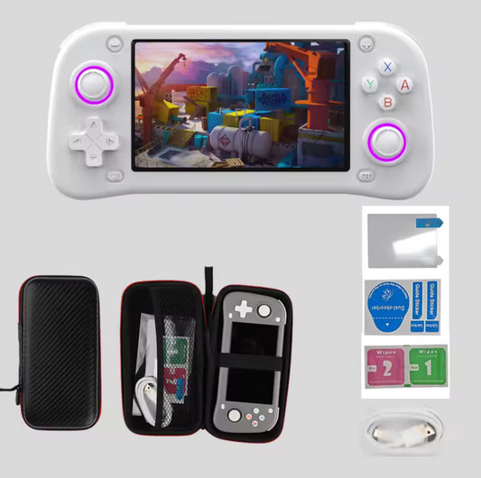 Handheld gaming console with screen displaying a game, surrounded by accessories on a light gray background.